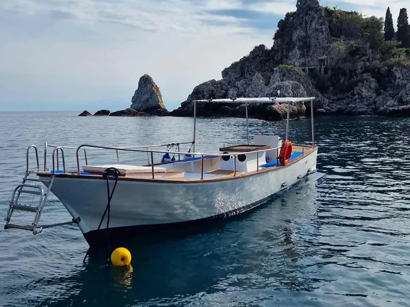 Iside boat off the Taormina coast